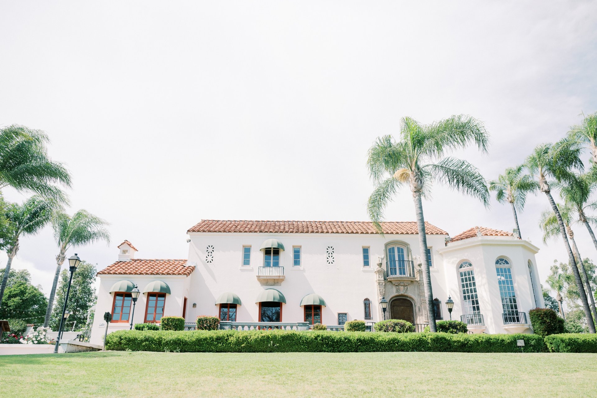 Muckenthaler Mansion exterior with palm trees